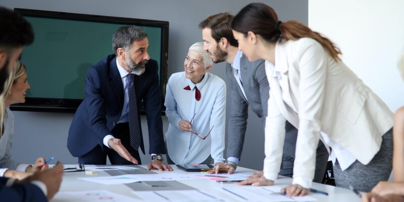 Creative business people working on business project in office